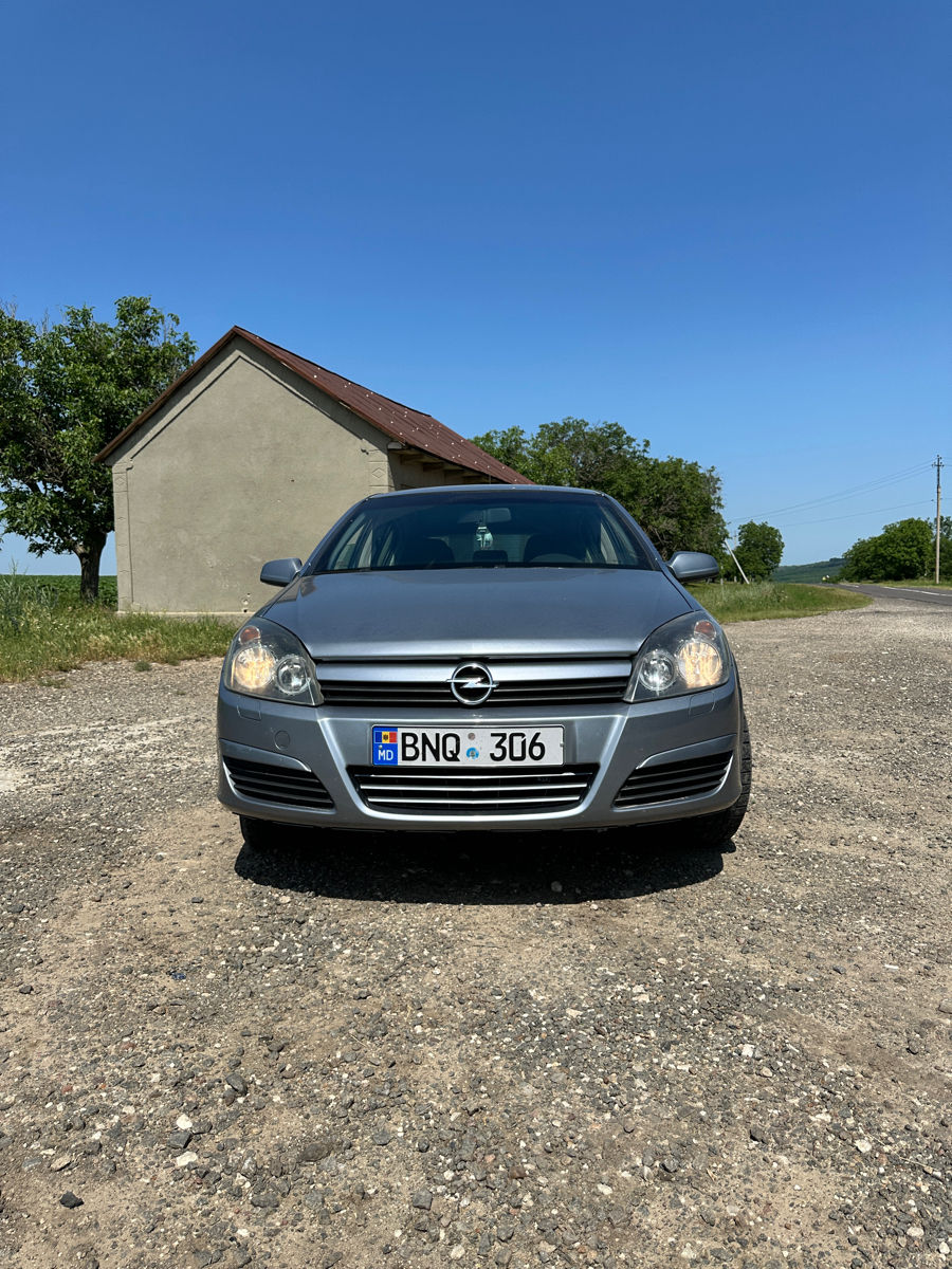 Opel Astra фото 8