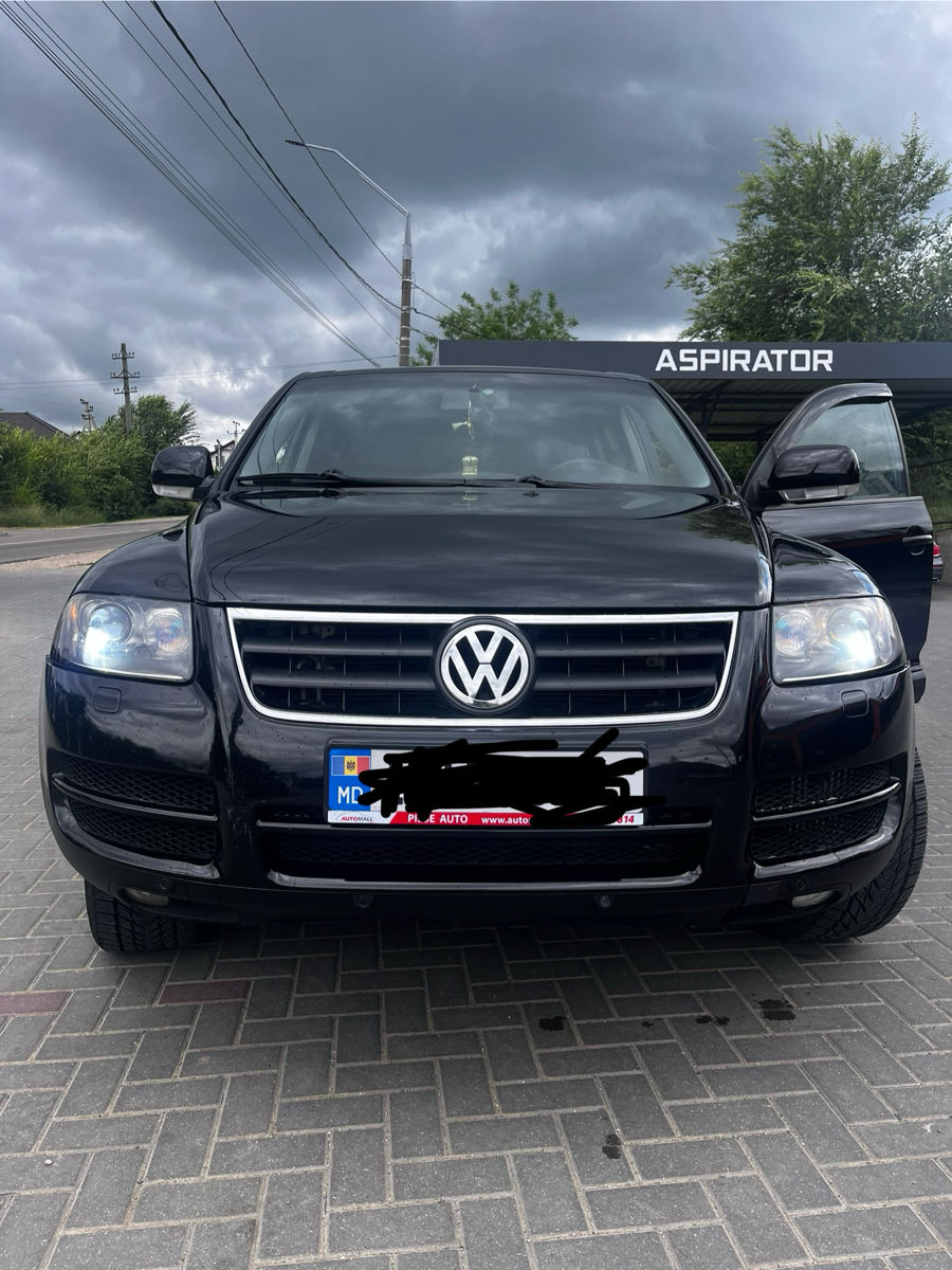 Volkswagen Touareg фото 0