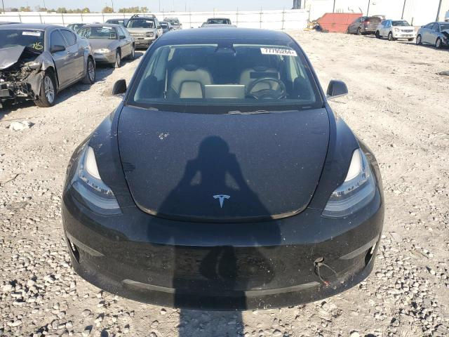 Tesla Model 3 foto 1