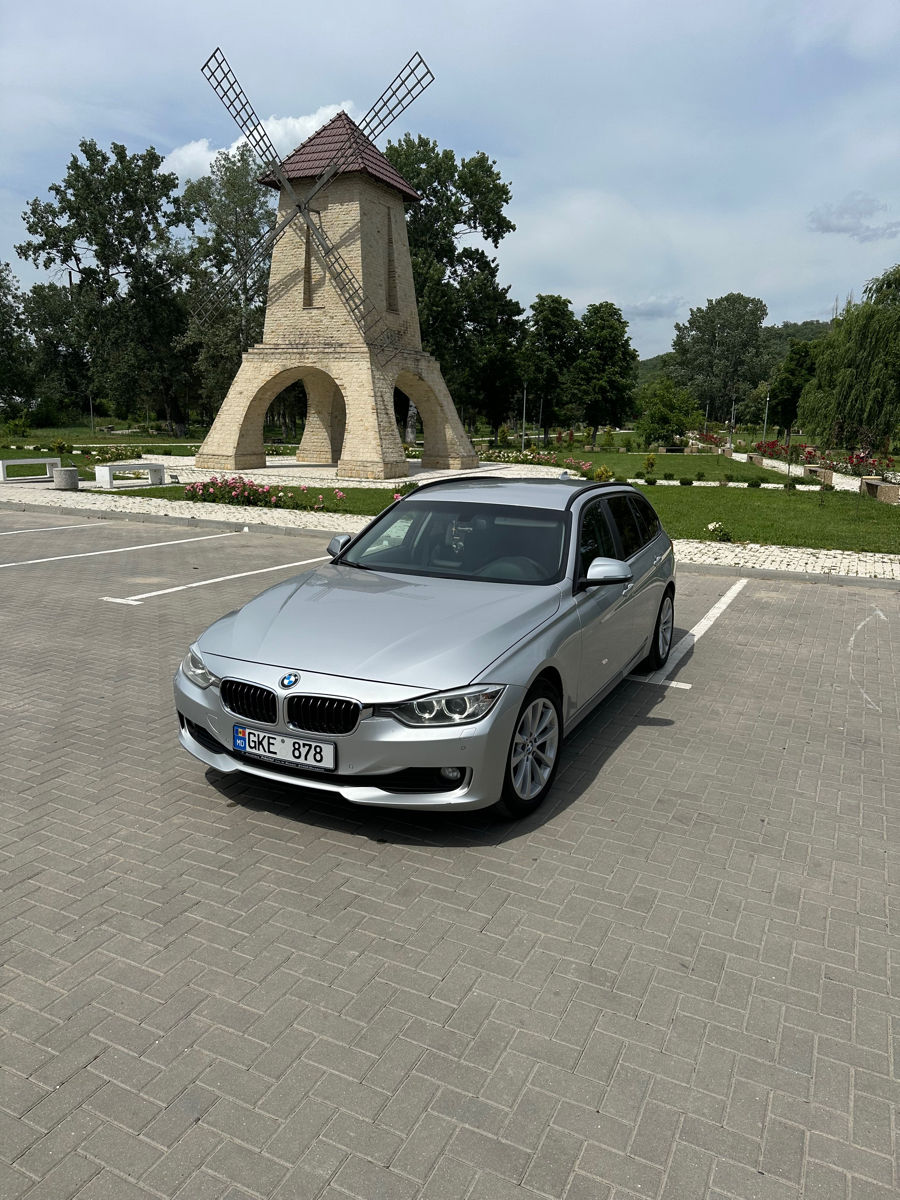 BMW 3 Series Touring foto 1