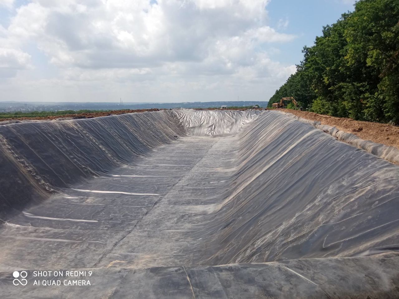 Накопители воды Bazin de acumulare acoperit cu geomembrana pret 9-13E/m3 apa foto 4