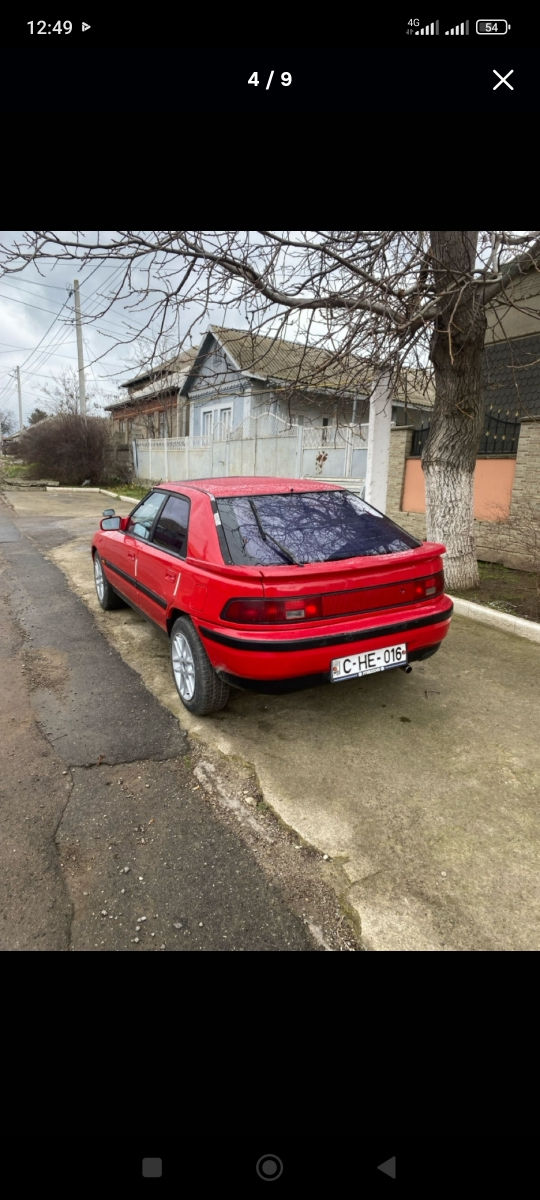 Mazda 323 фото 3