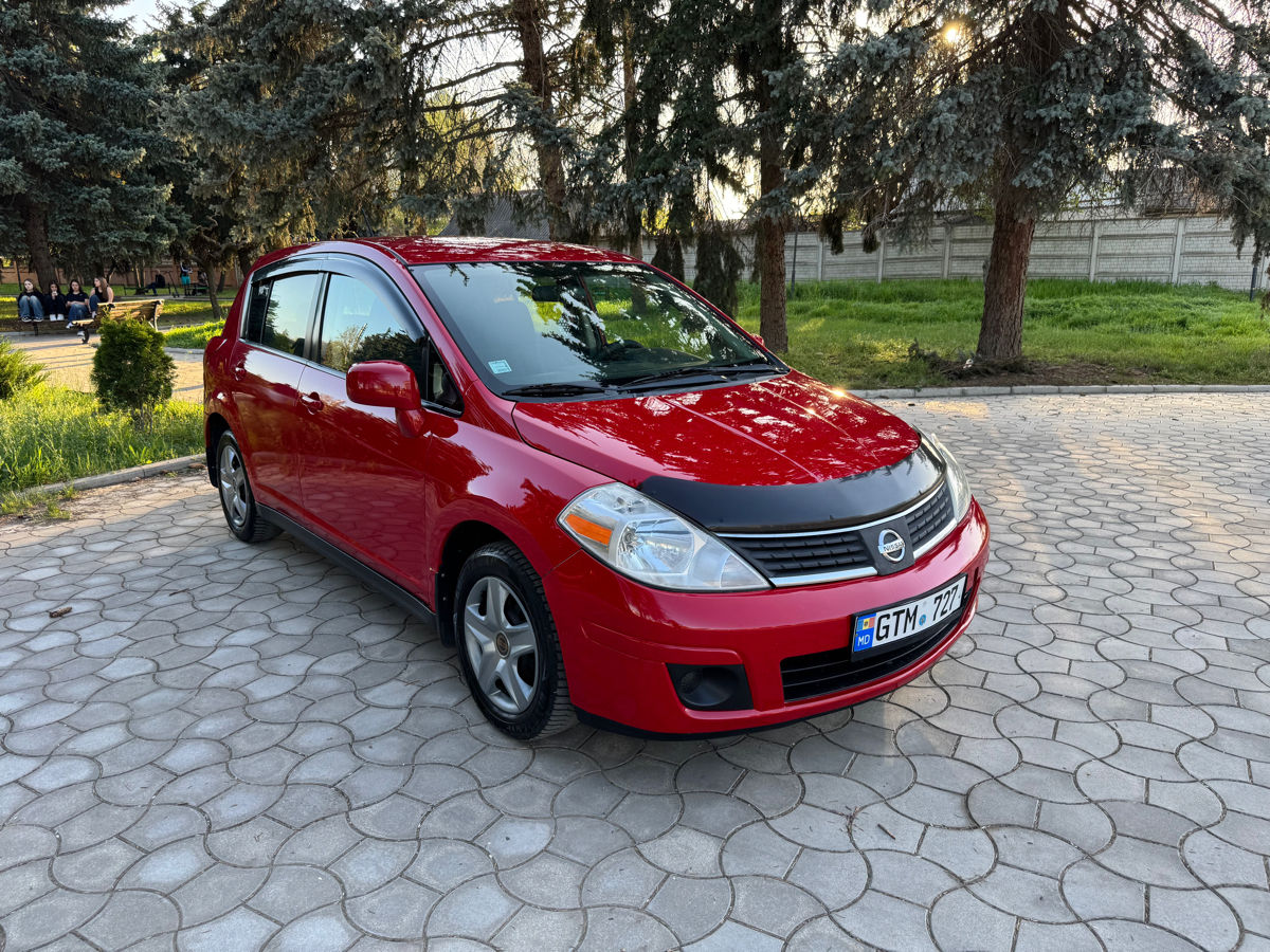 Nissan Tiida фото 1