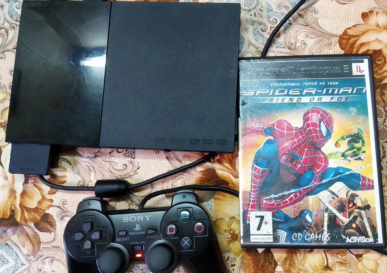 Продам PS 2 Slim (9 модель) чипованная + игры