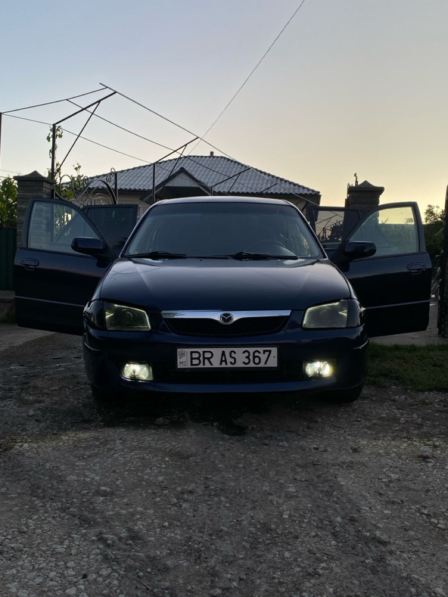 Mazda 323 фото 4