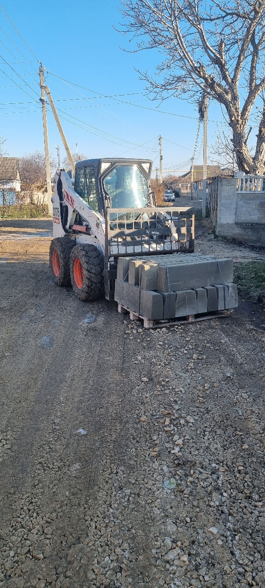 Bobcat excavator basculante gama de intrumente foto 5