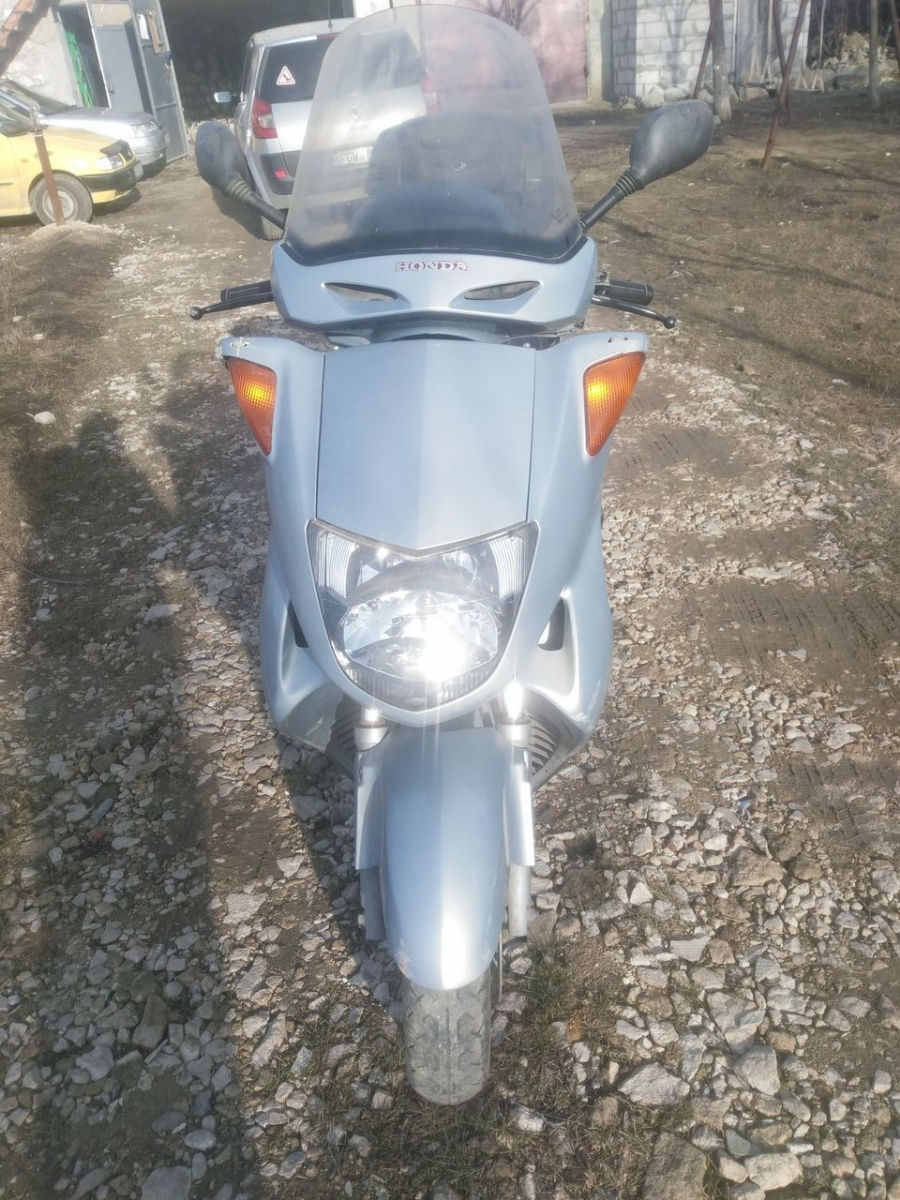 Honda Foresight фото 0