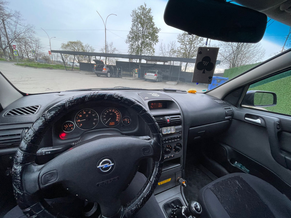 Opel Astra фото 4