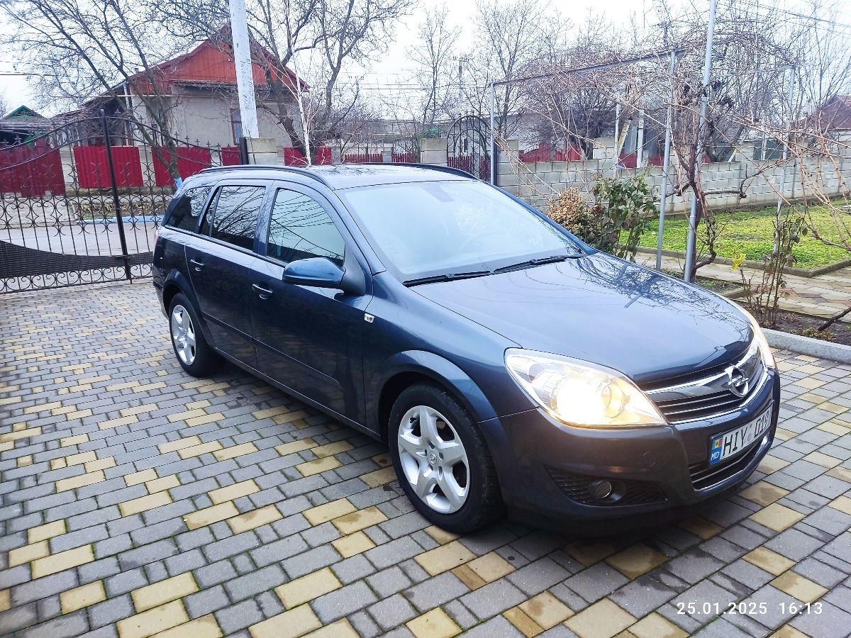 Opel Astra фото 1