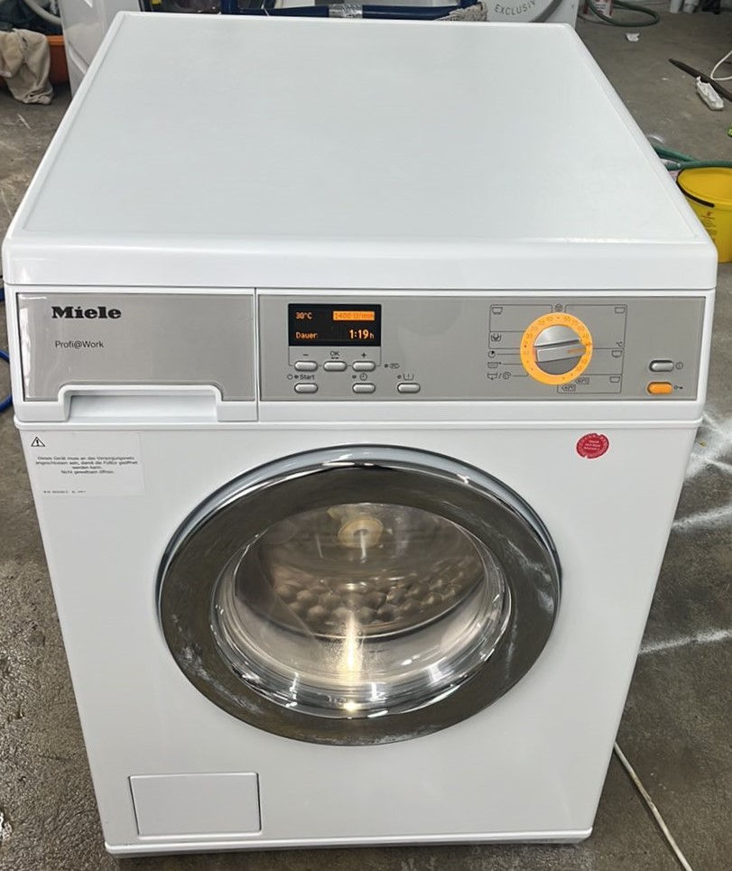 Профессиональная стиральная машина Miele фото 0