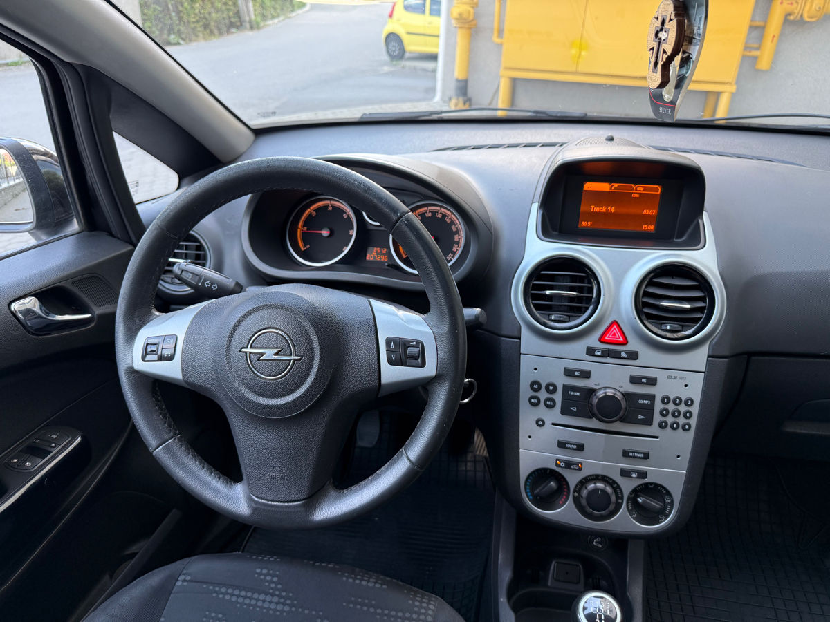 Opel Corsa фото 9