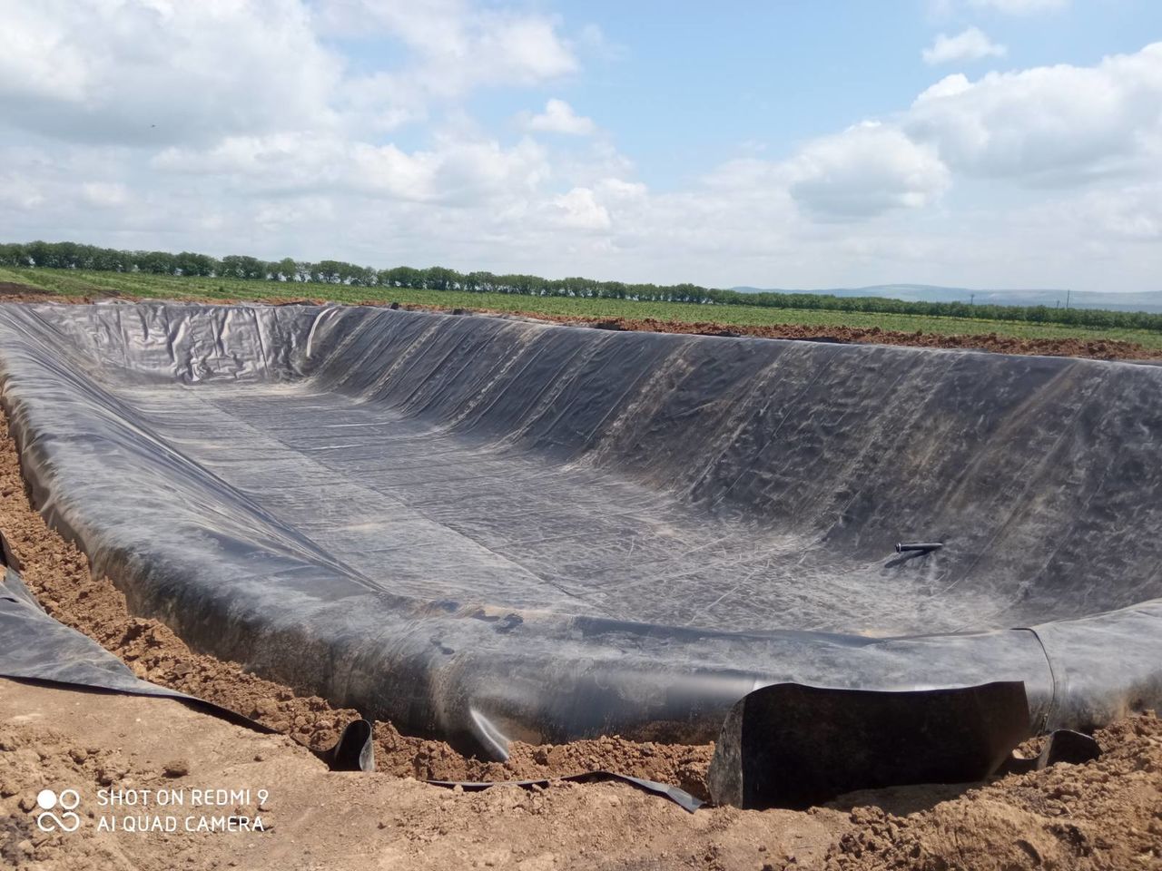 Накопители воды Bazin de acumulare acoperit cu geomembrana pret 9-13E/m3 apa foto 3