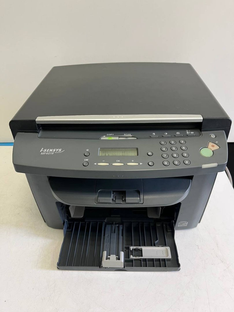 Multifunctionale alb-negru Canon MF4018 foto 0