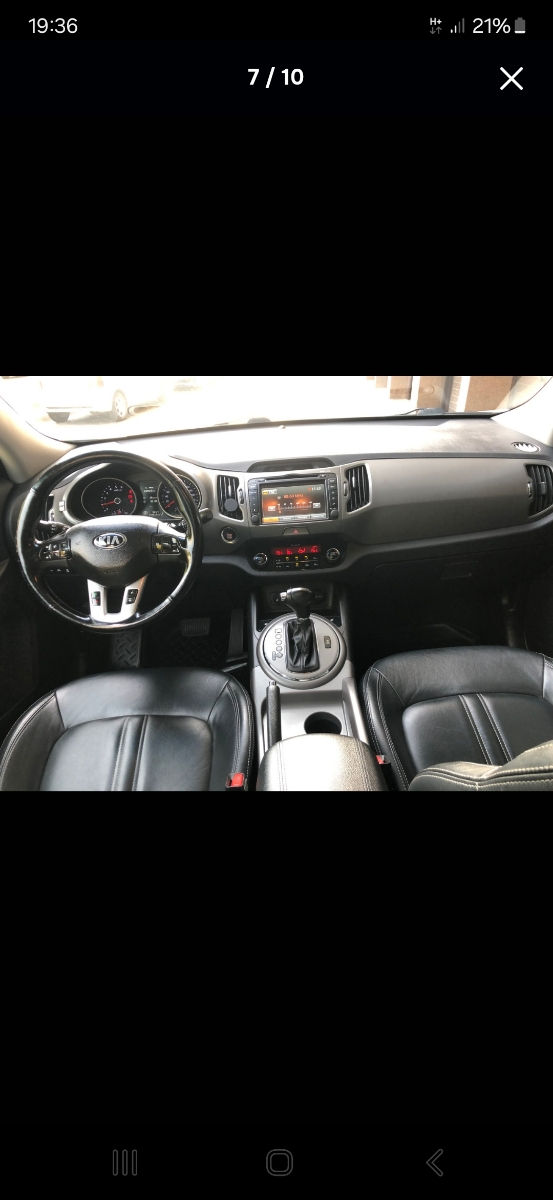 KIA Sportage фото 1