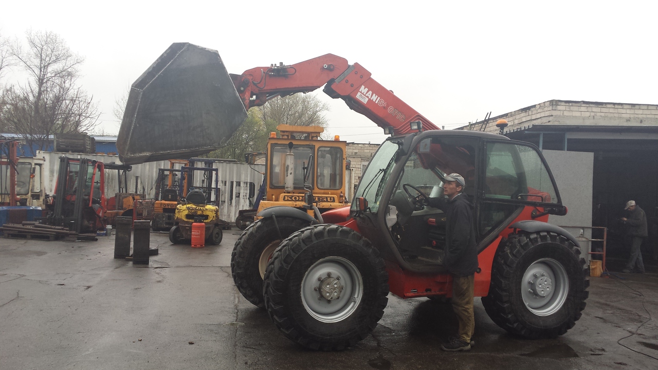 Stivuitor-incarcator telescopic Manitou фото 3