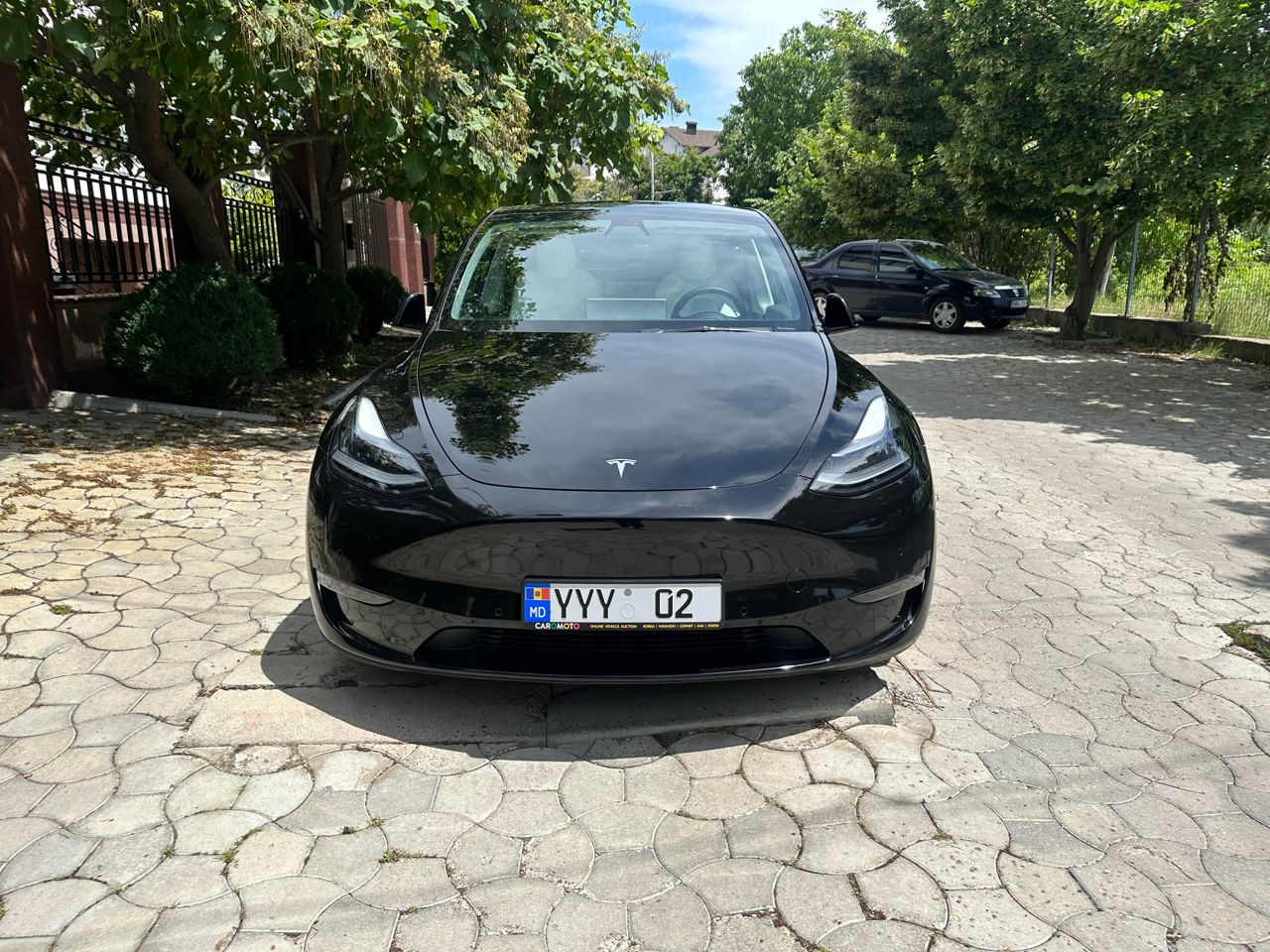 Tesla Model Y foto 1