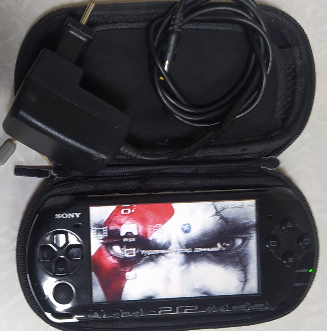 Продам прошитую PSP 3001 + 4 гб + игры