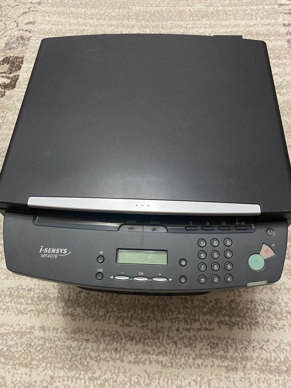 Canon i-sensys MF4018.
