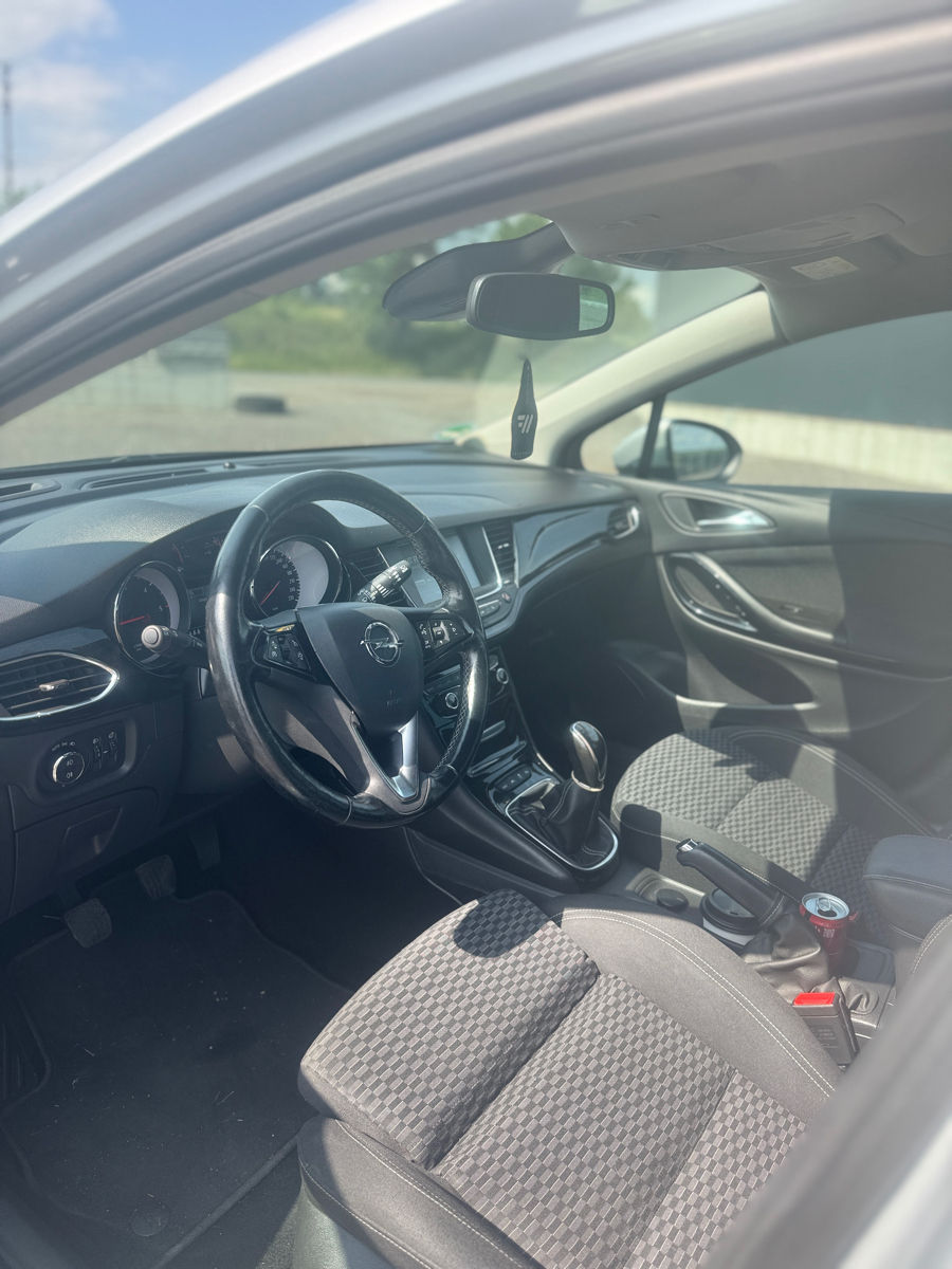 Opel Astra фото 7