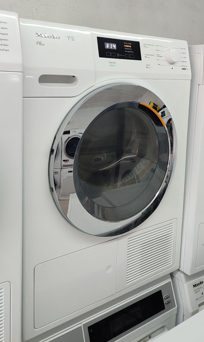 Сушильная машина Miele T1 фото 2