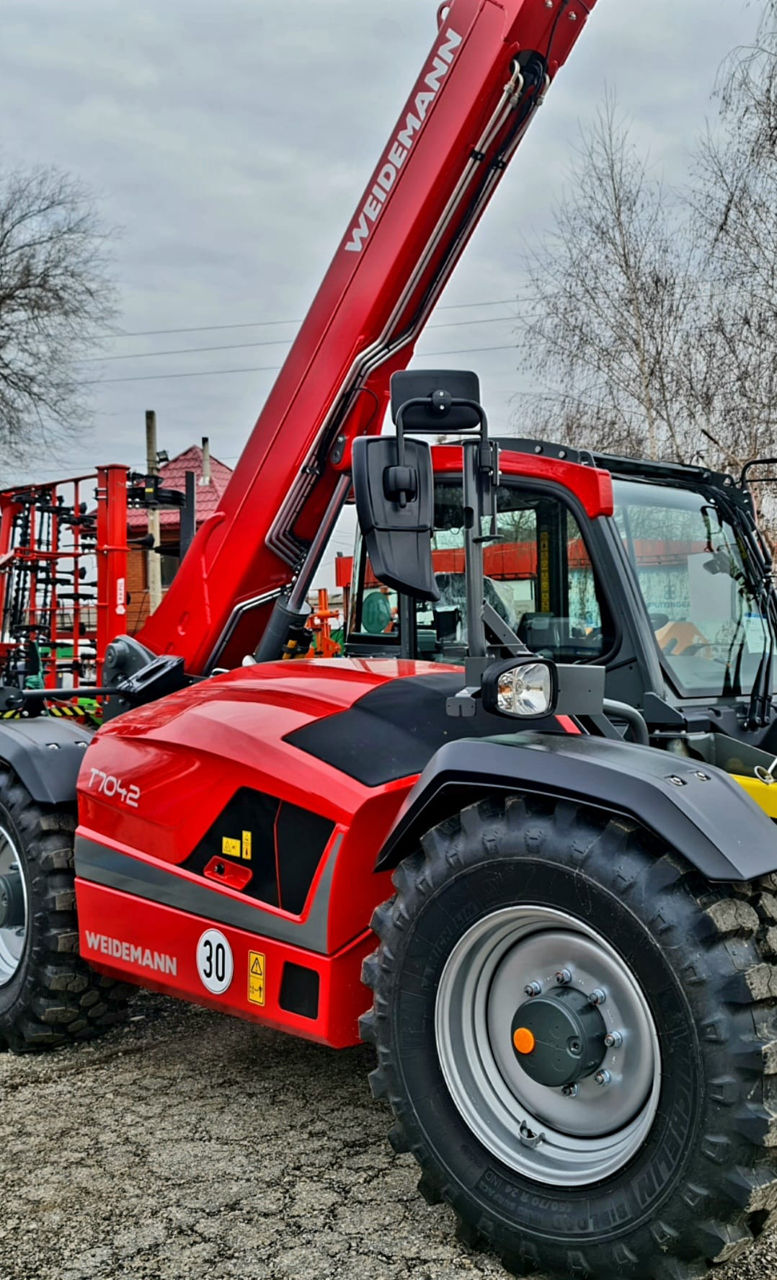 Телескопический погрузчик Weidemann T7042 foto 1
