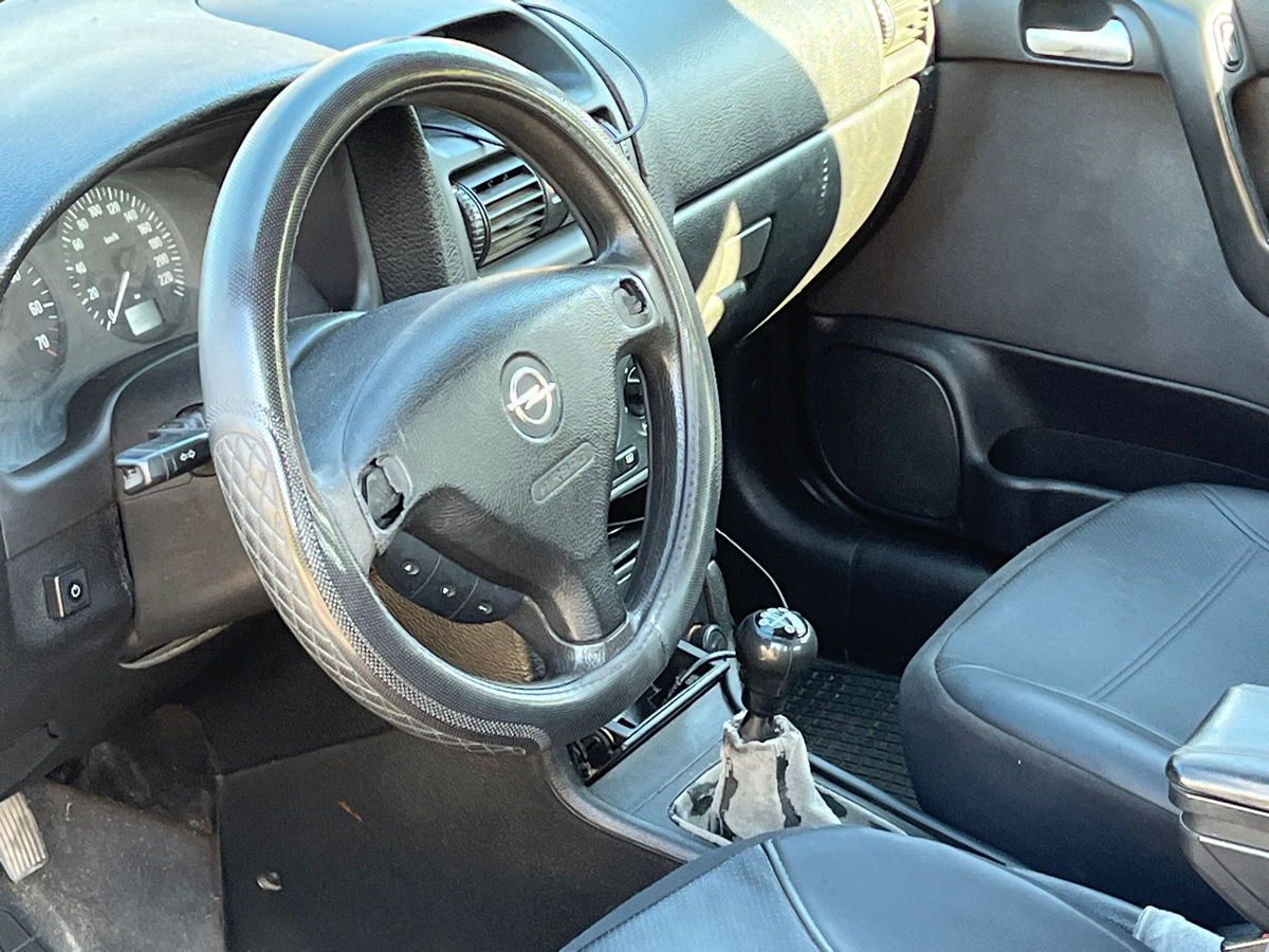 Opel Astra фото 6