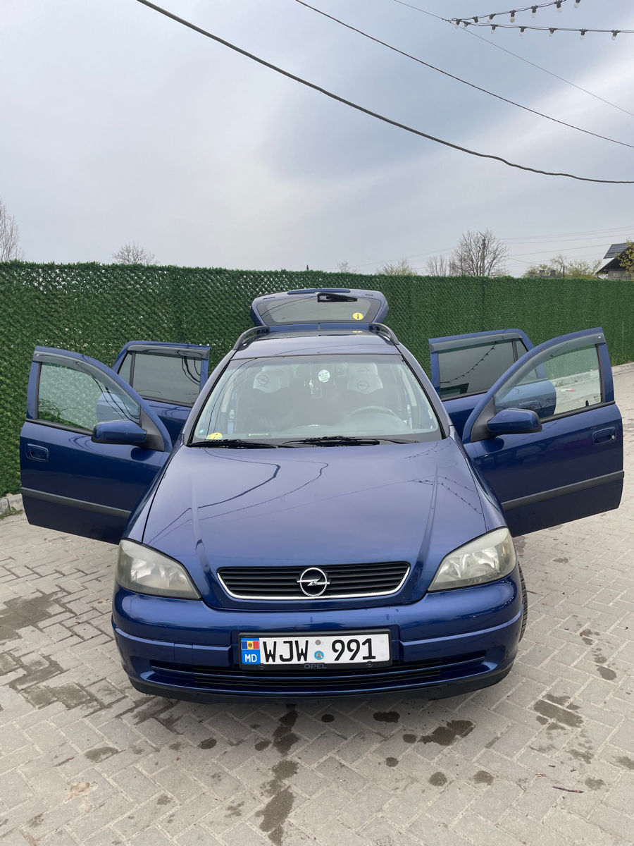 Opel Astra фото 7
