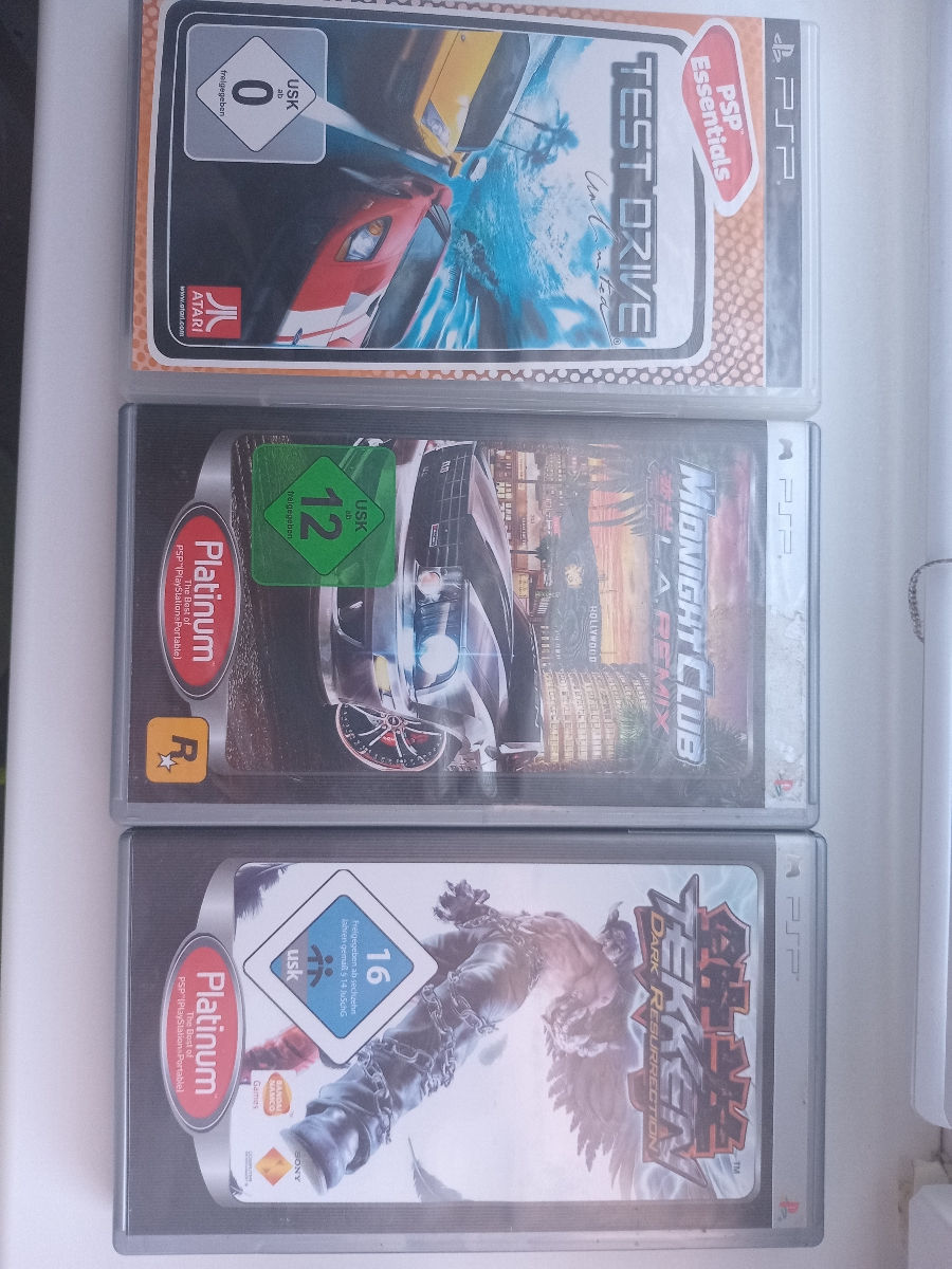 Troc Echange Psp kazi neuve + 2 jeux + 2 DVD sur