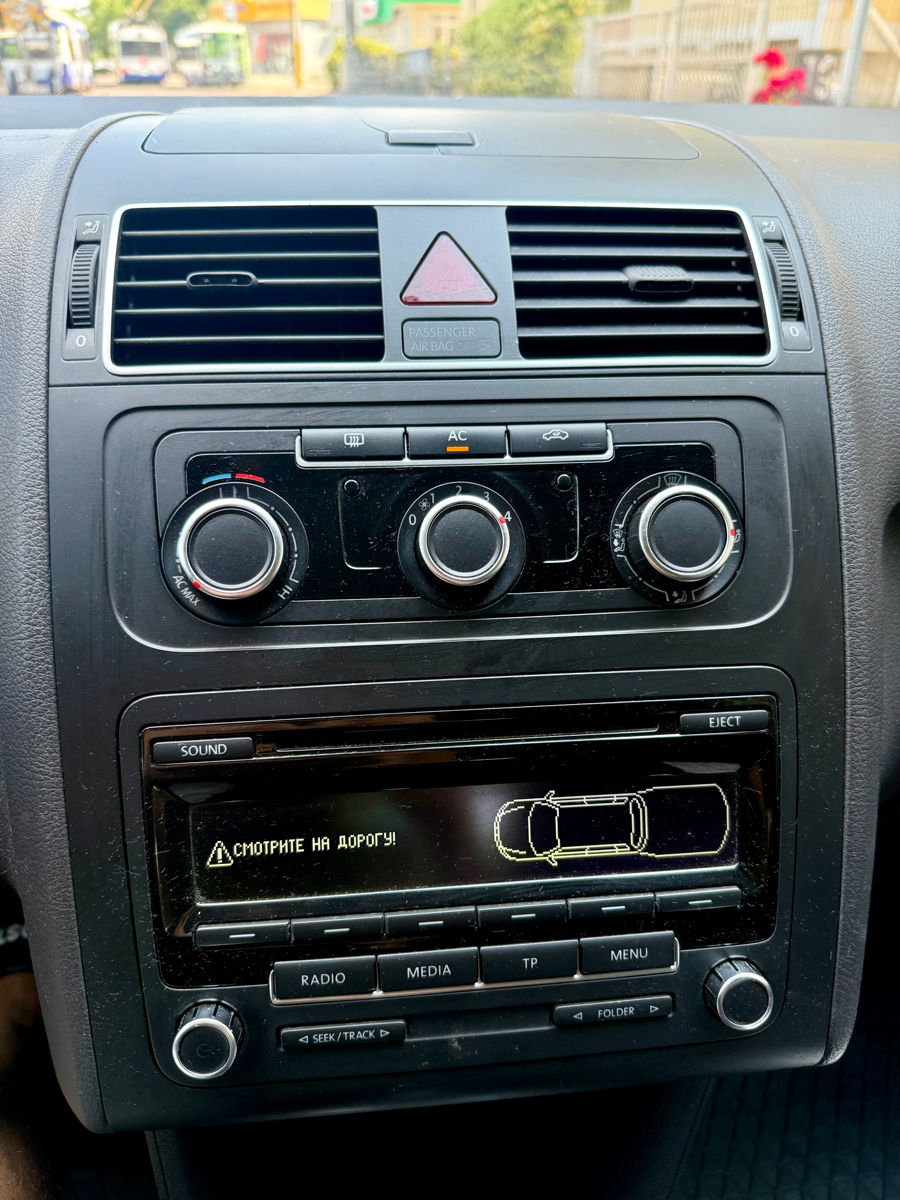 Volkswagen Touran фото 8