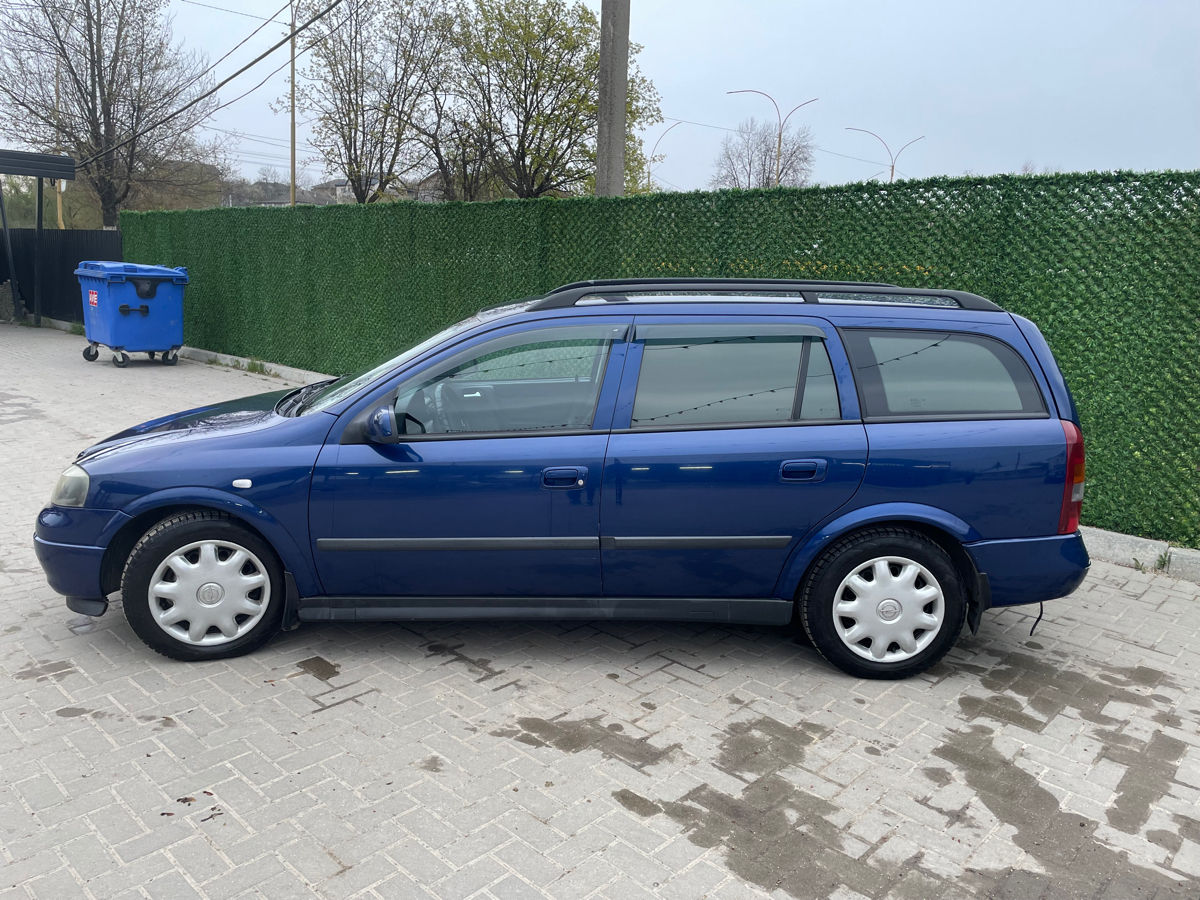 Opel Astra фото 6