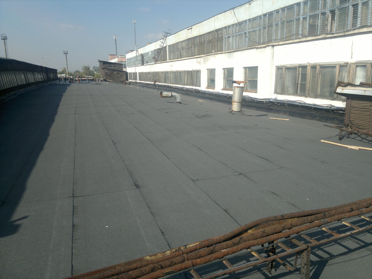 Lucrari de reparatie la acoperis moale (hydrobase,bipoli,ultra). reparam apartamente, garaje, hale foto 9
