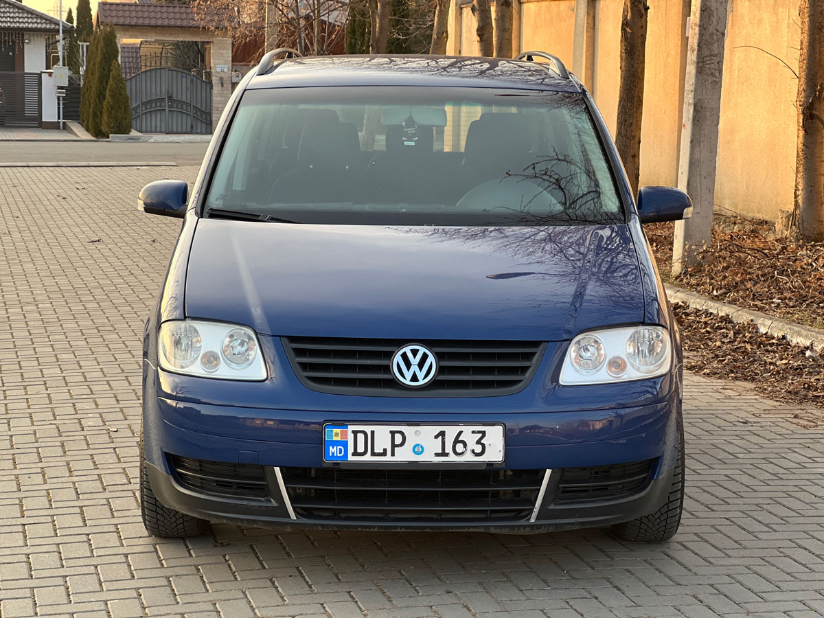 Volkswagen Touran фото 2