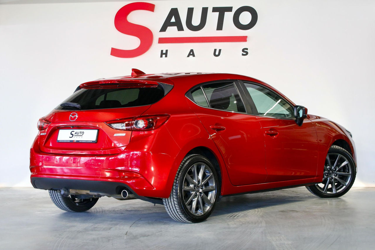 Mazda 3 фото 0