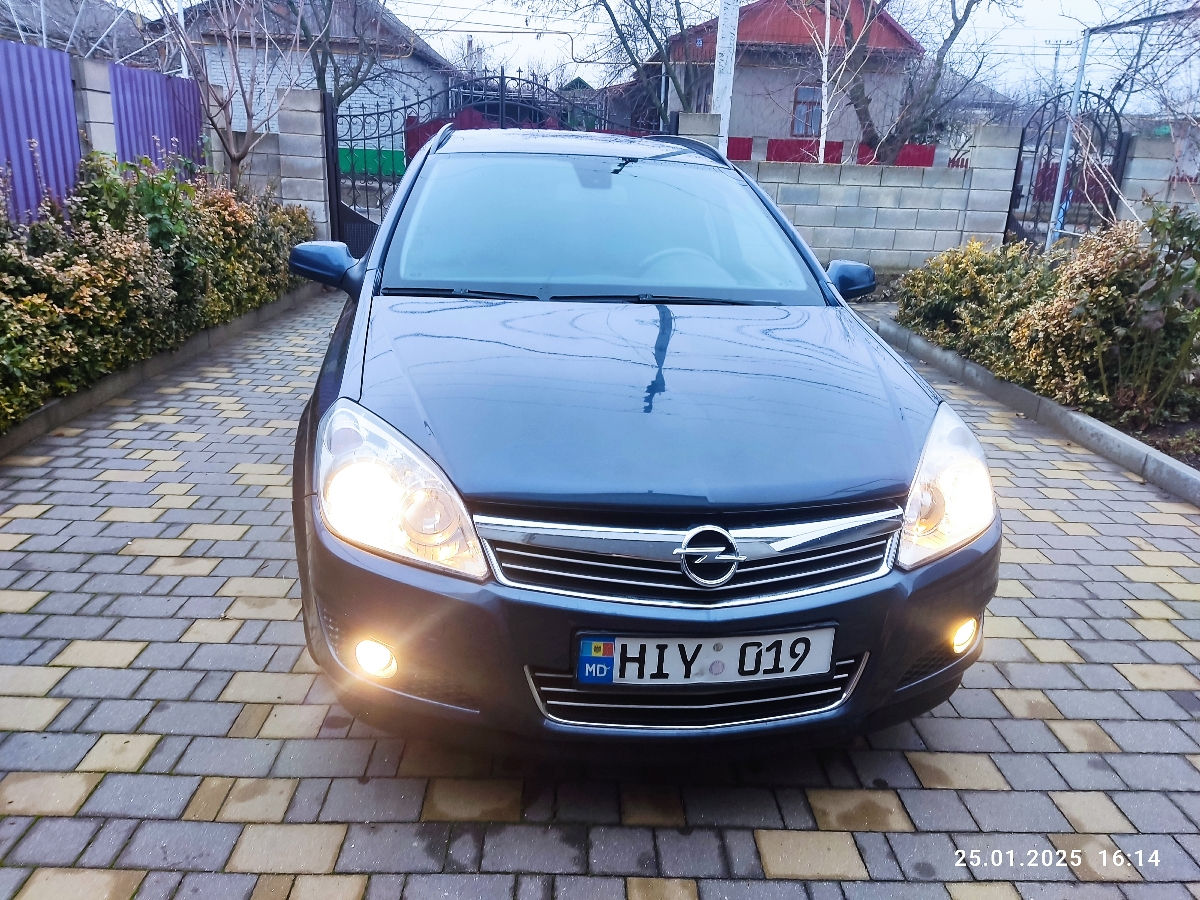 Opel Astra фото 2