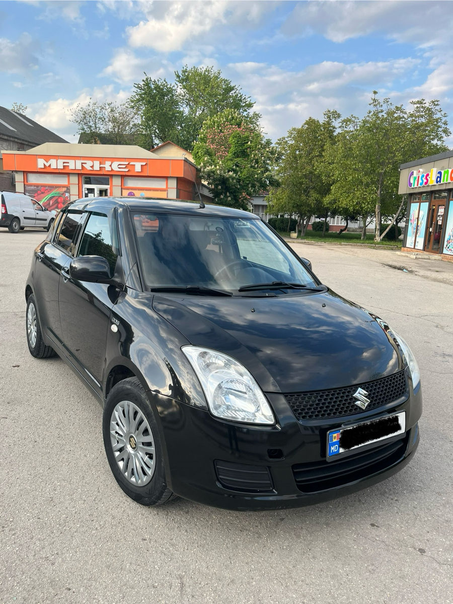 Suzuki Swift фото 0