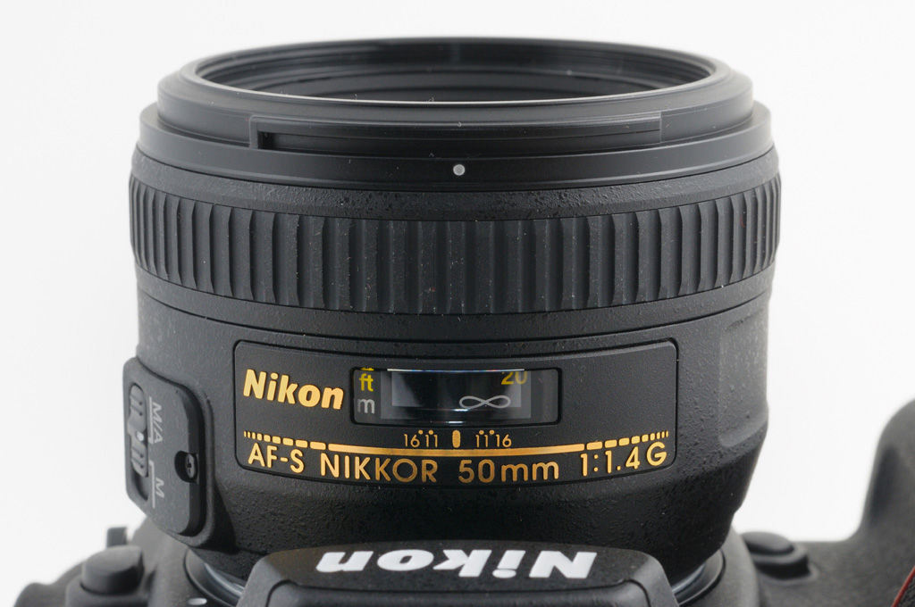 Никон 50 1.8 Фото
