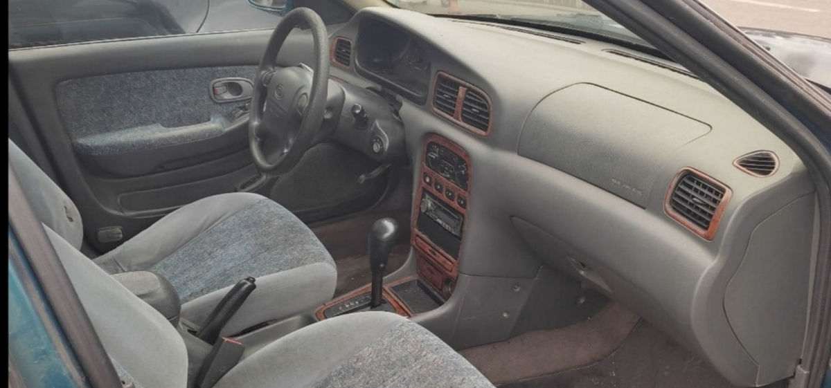 KIA Clarus фото 5