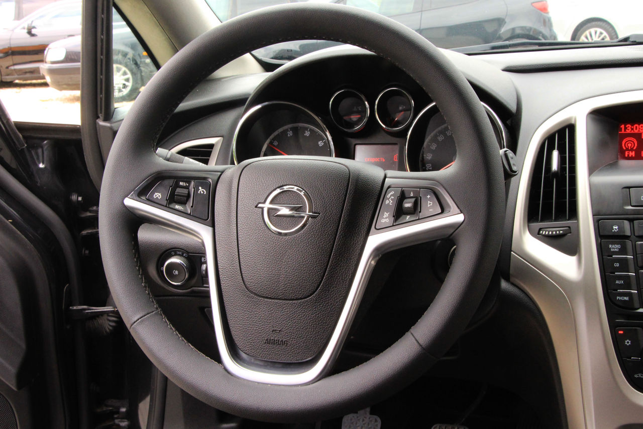 Opel Astra фото 10