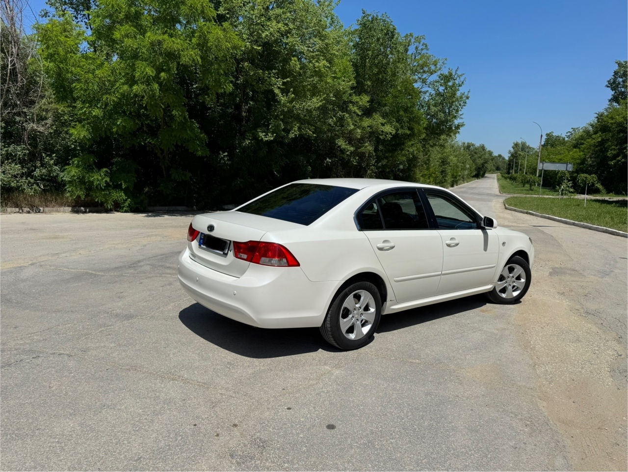 KIA Optima фото 1