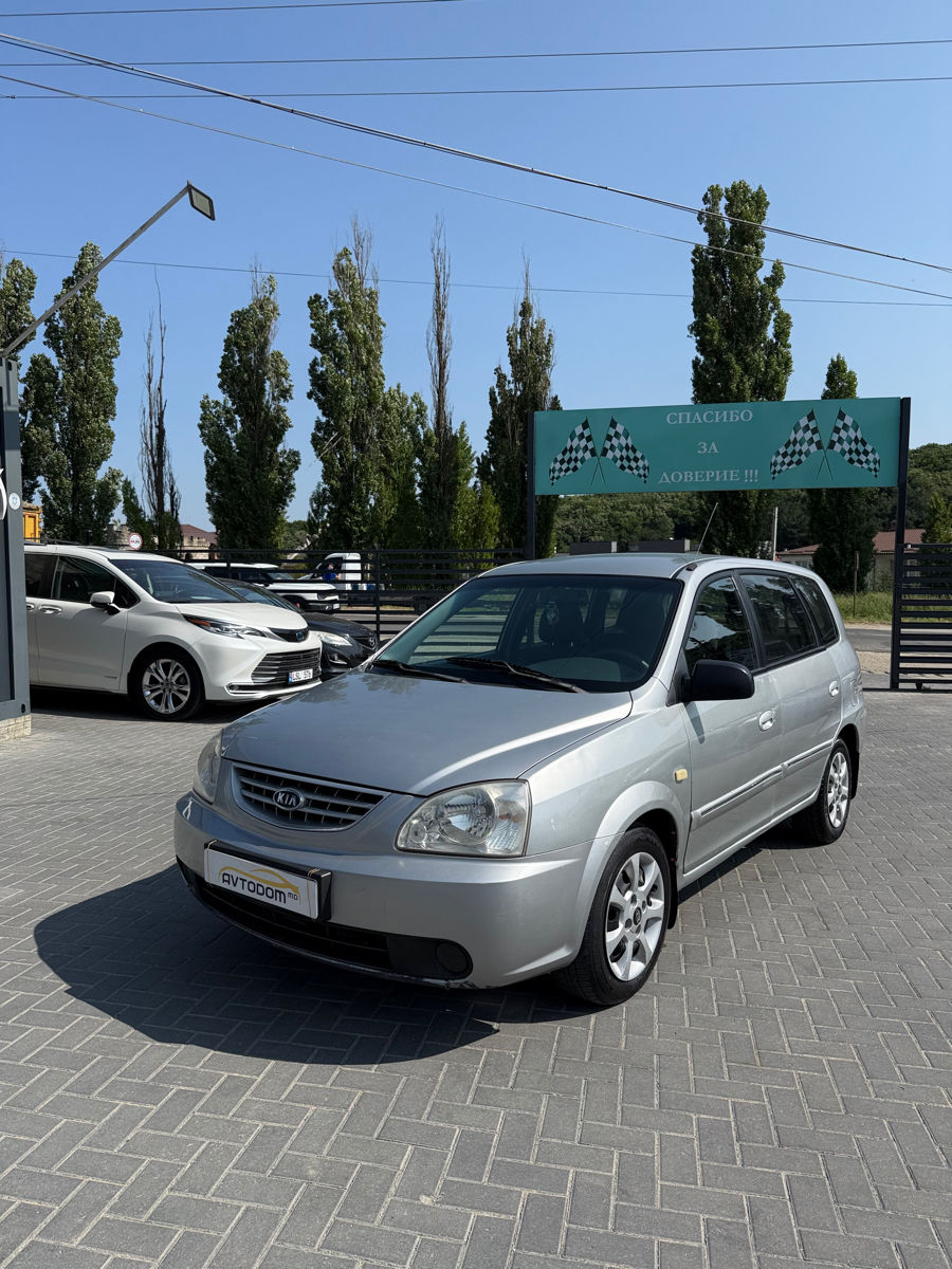 KIA Carens фото 0