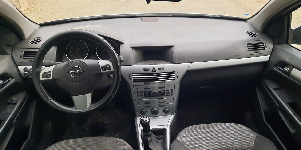 Opel Astra фото 8