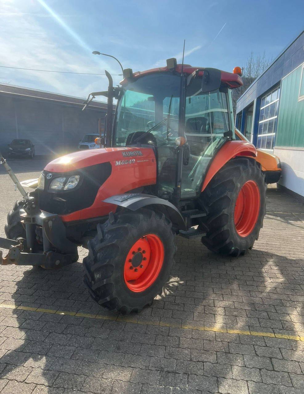 Kubota M6040  foto 1