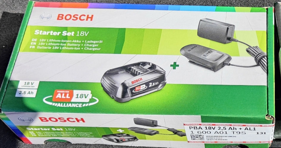 Bosch комплект аккумулятор и зарядка foto 2