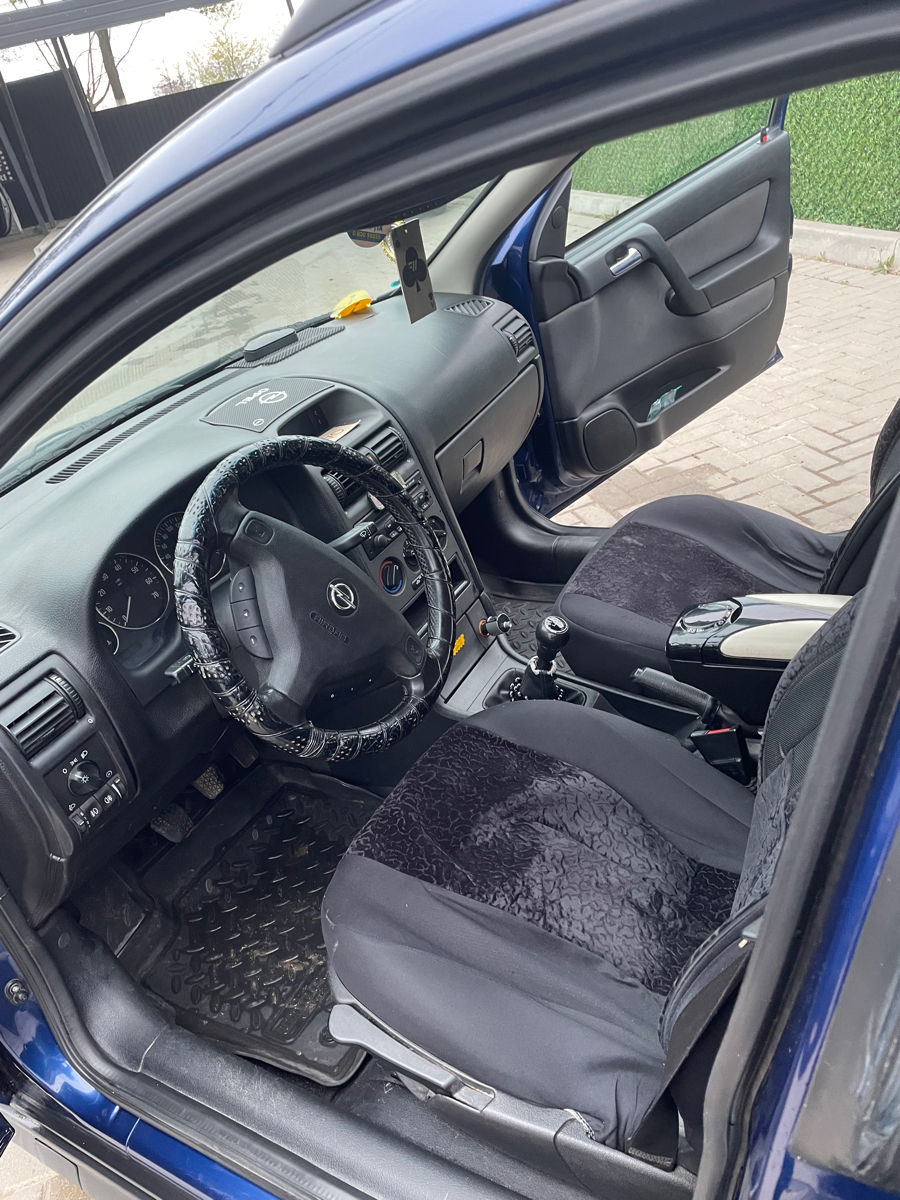 Opel Astra фото 1