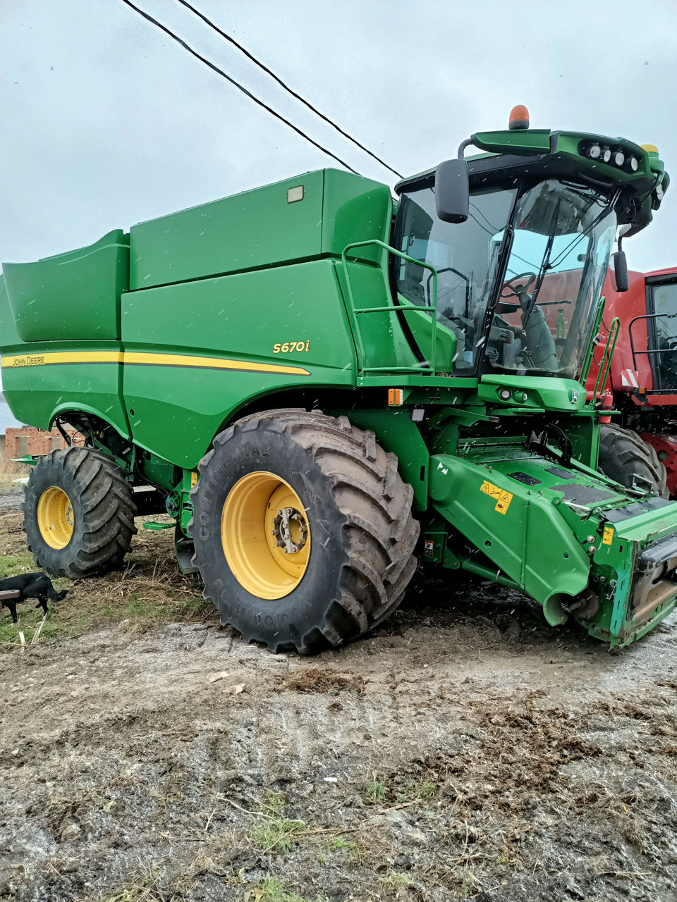 Combina John Deere S670i. foto 1