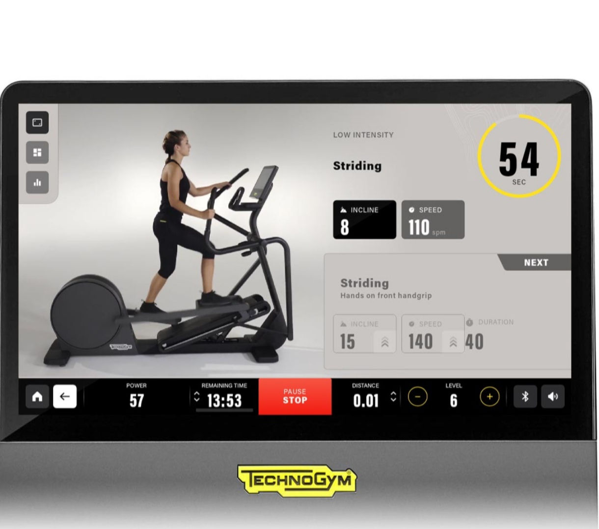 Профессиональный эллиптический тренажор Technogym foto 2