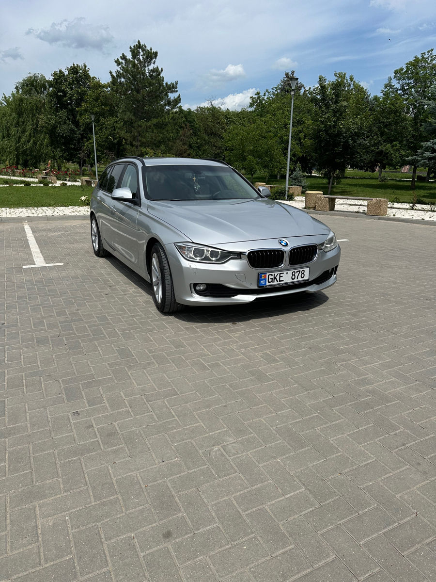 BMW 3 Series Touring foto 3