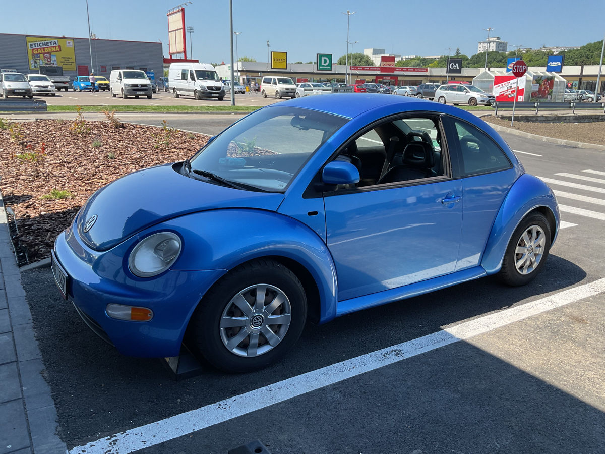 Volkswagen New Beetle foto 1