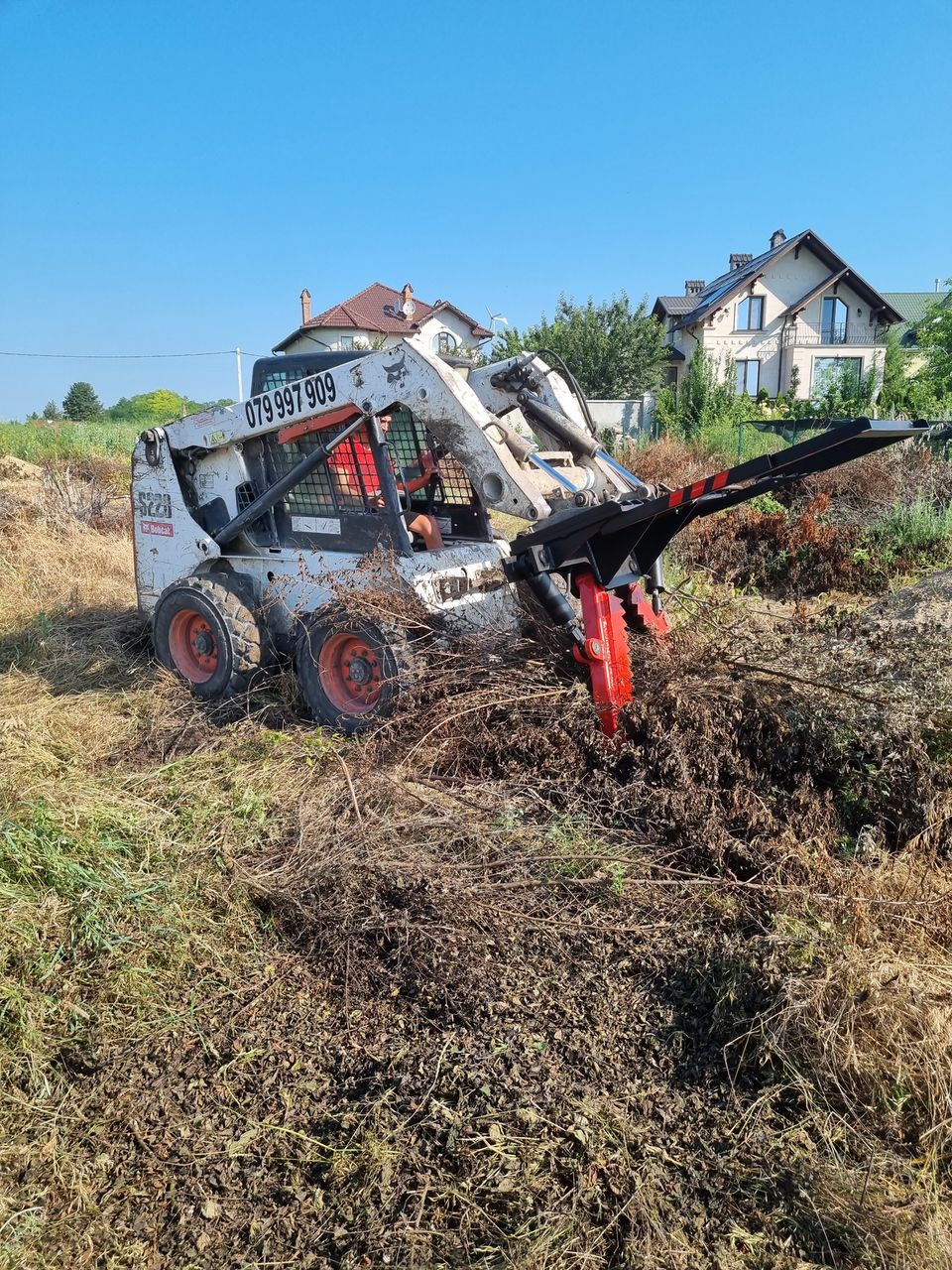 Curatarea terenurilor,indreptarea lor,servicii de terasament foto 0