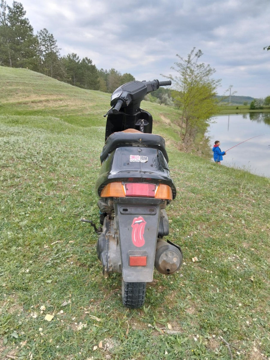 Suzuki AG100 foto 2